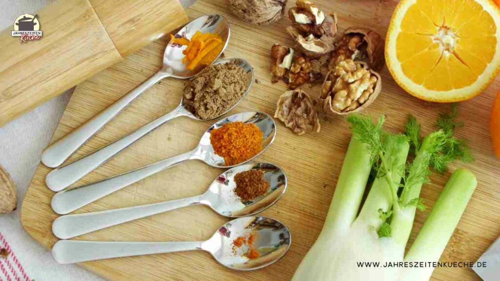 Zutaten für Winter-Risotto mit Fenchel liegen auf einem Holzbrett