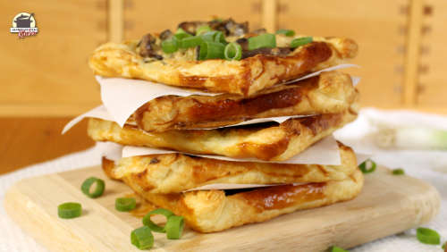 Blätterteig-Snacks mit Champignons und Frühlingszwiebeln